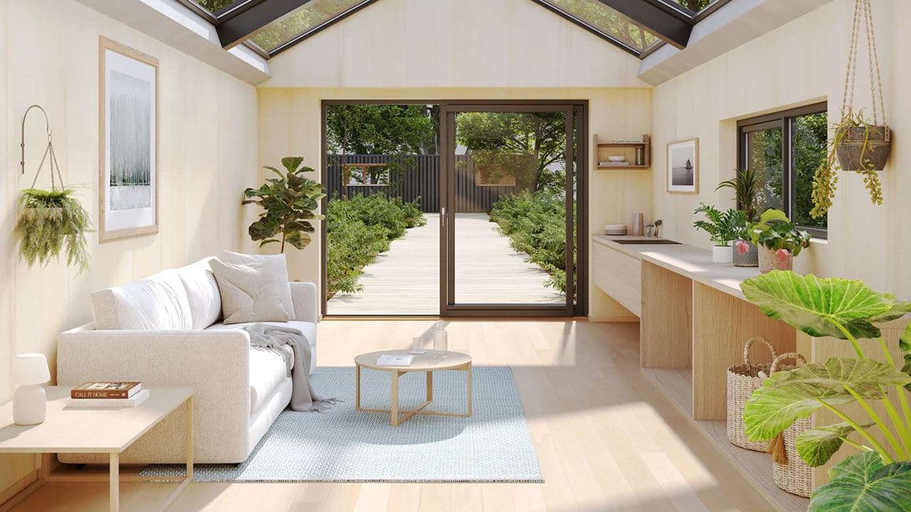 Lys moderne stue med interiørplater i tre på veggene.