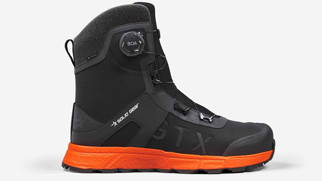 Produktbilde av vintersko med oransje såle.